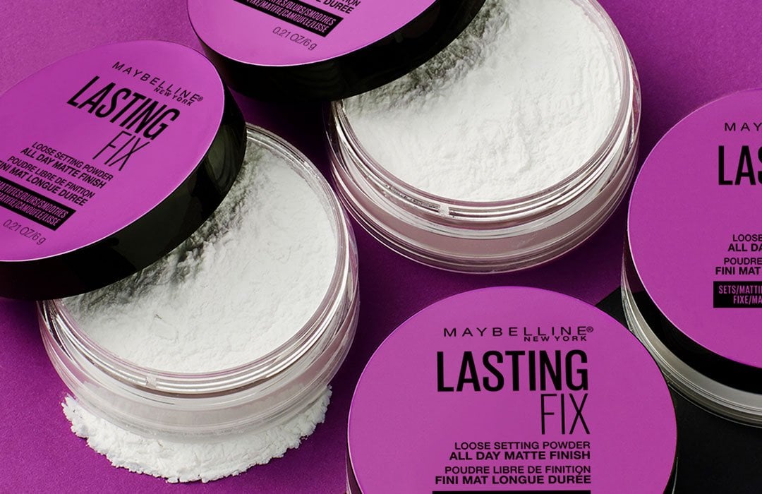 Product lay down shot of Maybelline's Lasting Fix translucent Loose Setting powder.