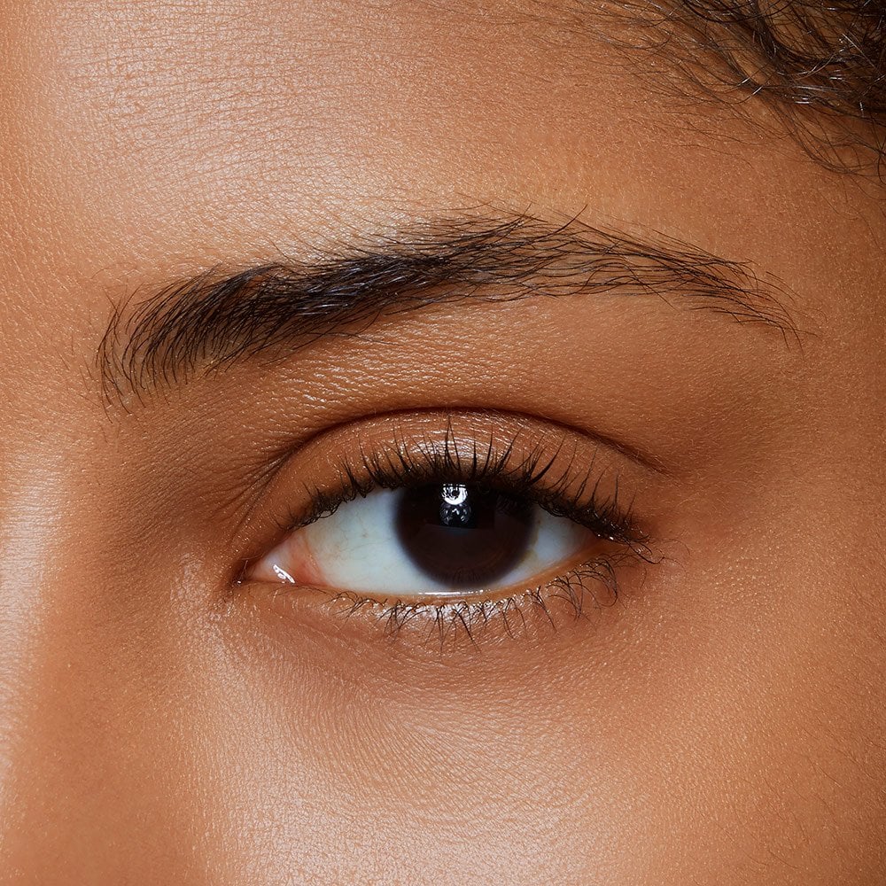 Black-brown eyebrow before Brow Fast Sculpt eyebrow tinting makeup by Maybelline is applied.