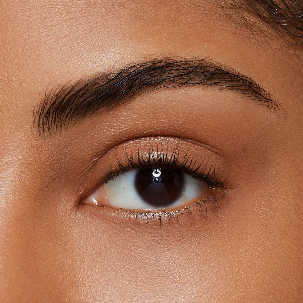 Black-brown eyebrow after Brow Fast Sculpt eyebrow tinting makeup by Maybelline is applied.