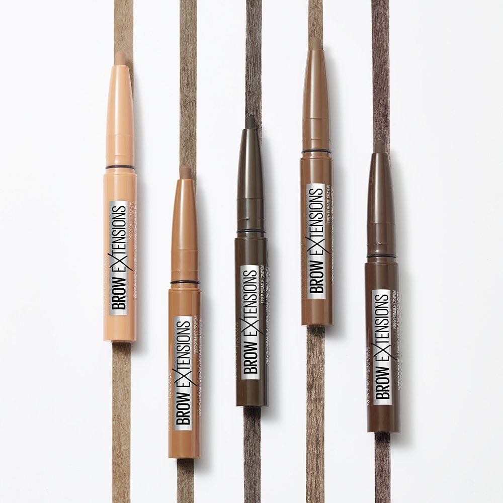 Product laydown of Maybelline Brow Extensions Fiber Pomade Crayon to make your eyebrows thicker.