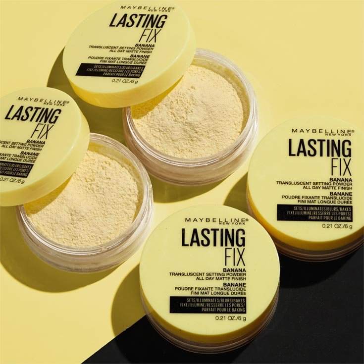Product lay down shot of banana setting powder makeup by Maybelline New York.