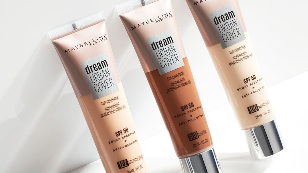 Product laydown shot of Maybelline Dream Urban Cover Flawless Coverage Foundation Makeup.